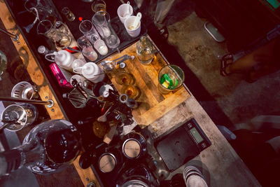 High angle view of bottles on table