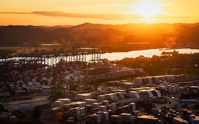 High angle view of townscape against sky during sunset