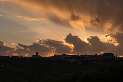 Scenic view of silhouette against sky during sunset