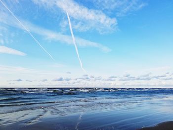 Scenic view of beach against sky