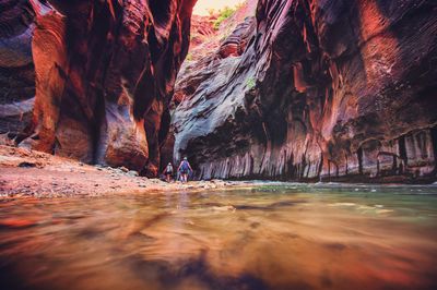 Scenic view of sea by cave