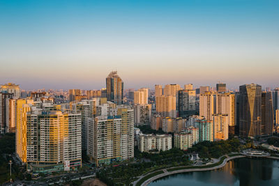 High angle view of buildings in city against sky