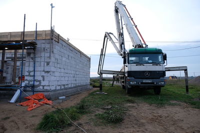 Construction site on field against sky