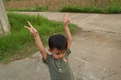 Boy standing on floor