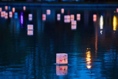 Reflection of illuminated lights at night