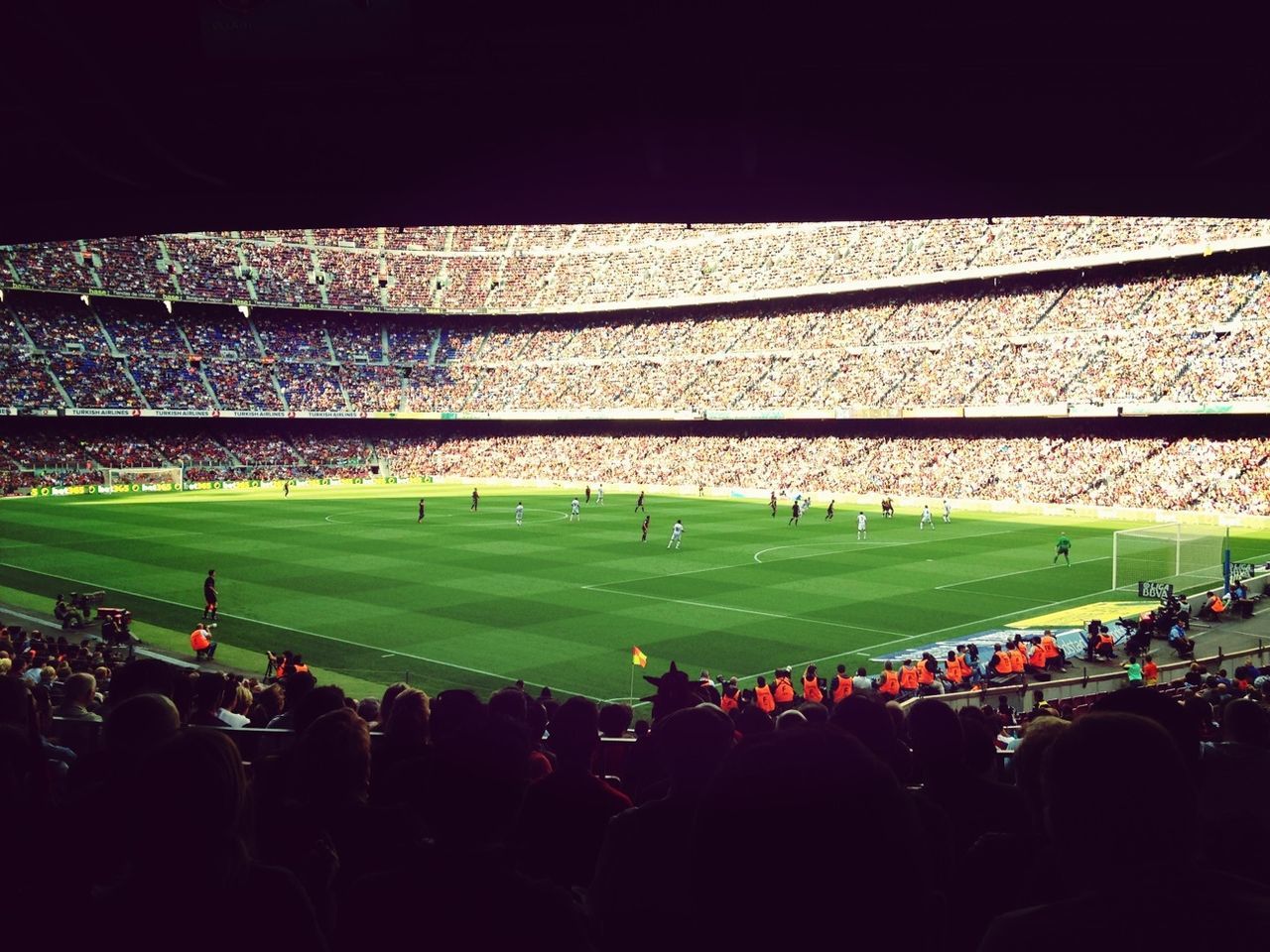 large group of people, crowd, men, lifestyles, person, leisure activity, grass, green color, sport, stadium, night, spectator, standing, outdoors, high angle view, togetherness, mixed age range