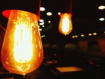 Close-up of illuminated light bulb