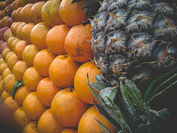 Close-up of orange fruits for sale in market