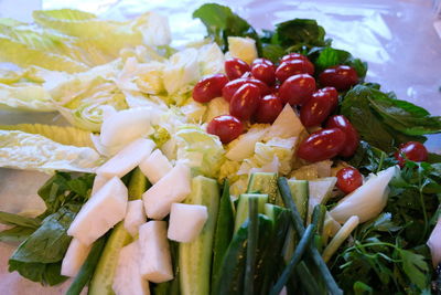 Close-up of chopped fruits in plate