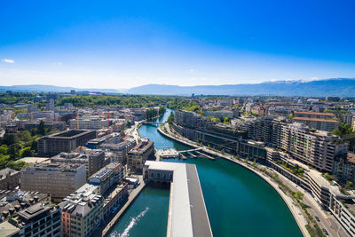 High angle view of river amidst buildings in city