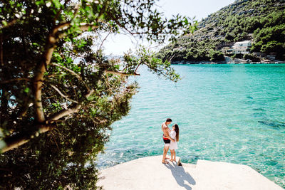 People on the sea shore