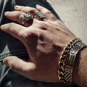 Cropped image of man hand wearing jewelry