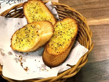 High angle view of bread in basket on table