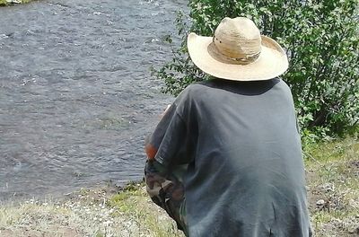 Close-up of woman standing in pond