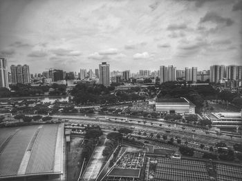 High angle view of city buildings against sky