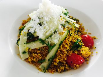 High angle view of fresh meal served in plate on white background