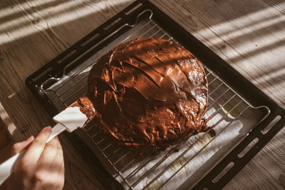 High angle view of person preparing food