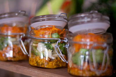 Close-up of ice cream in jar on table