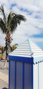 Built structure on beach against sky