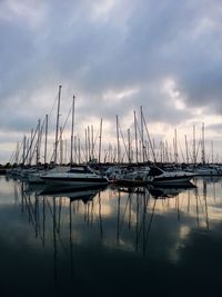 Boats moored at harbor