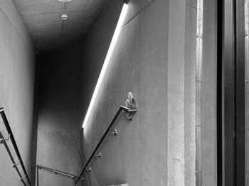 Low angle view of illuminated bridge in building