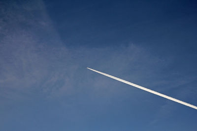 Low angle view of vapor trail in sky