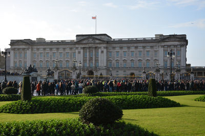 Group of people in front of historical building