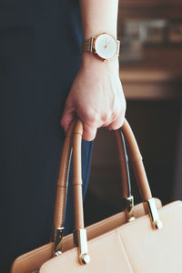 Close-up of woman holding hands