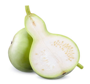 Close-up of bananas against white background