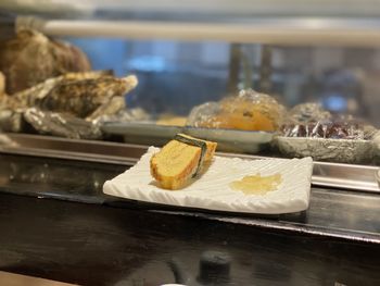 Close-up of ice cream cone on table at store