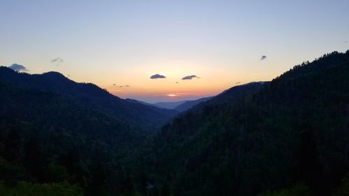 Scenic view of mountains against sky during sunset