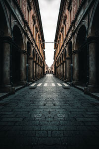 Narrow alley along buildings
