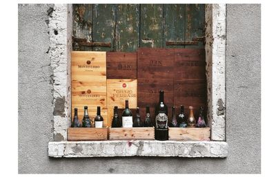 View of wine bottles on wooden table