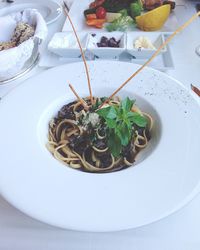 High angle view of pasta in plate on table