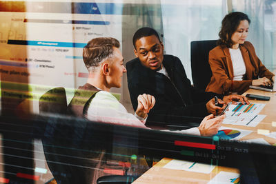 Business colleagues working in office