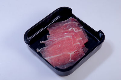 High angle view of ice cream over white background