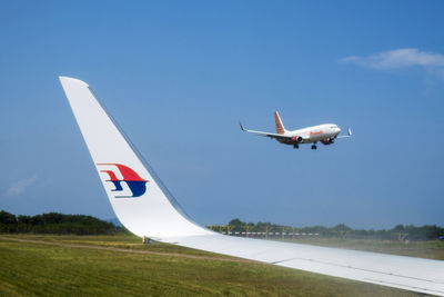 Airplane flying in sky