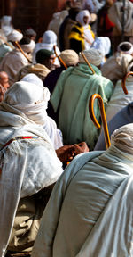 Men wearing traditional clothing outdoors