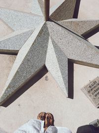 Low section of people standing on staircase