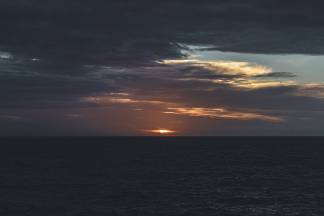 sky, sea, cloud, beauty in nature, water, horizon over water, horizon, scenics - nature, tranquility, tranquil scene, sunset, nature, no people, idyllic, ocean, dramatic sky, seascape, outdoors, coast, waterfront, sunlight, non-urban scene, environment, afterglow