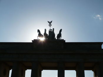 Low angle view of quadriga statue at brandenburg gate