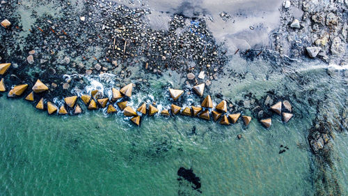 High angle view of rocks in water