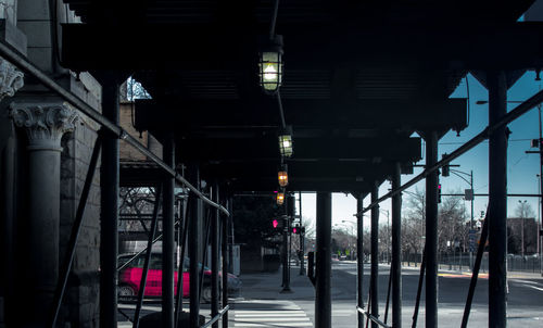 Man walking in illuminated city