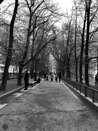 People walking on street in city