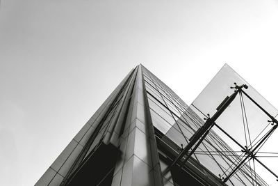 Low angle view of skyscraper against clear sky