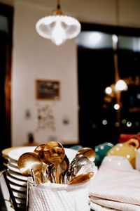 Close-up of christmas decorations on table at home