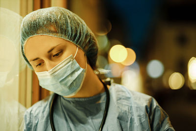 Exhausted doctor wearing mask