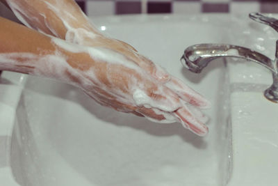 Close-up of hand in water