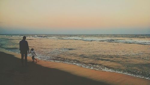 Scenic view of sea at sunset