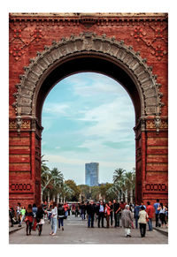 Group of people in front of historical building